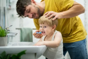 "how to care for baby teeth – brushing first teeth at home" 